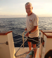 man fishing with a net
