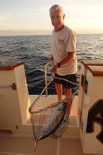 man fishing with a net